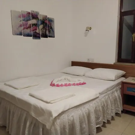 Δωμάτια σε οικογενειακή κατοικία Meltem Κας